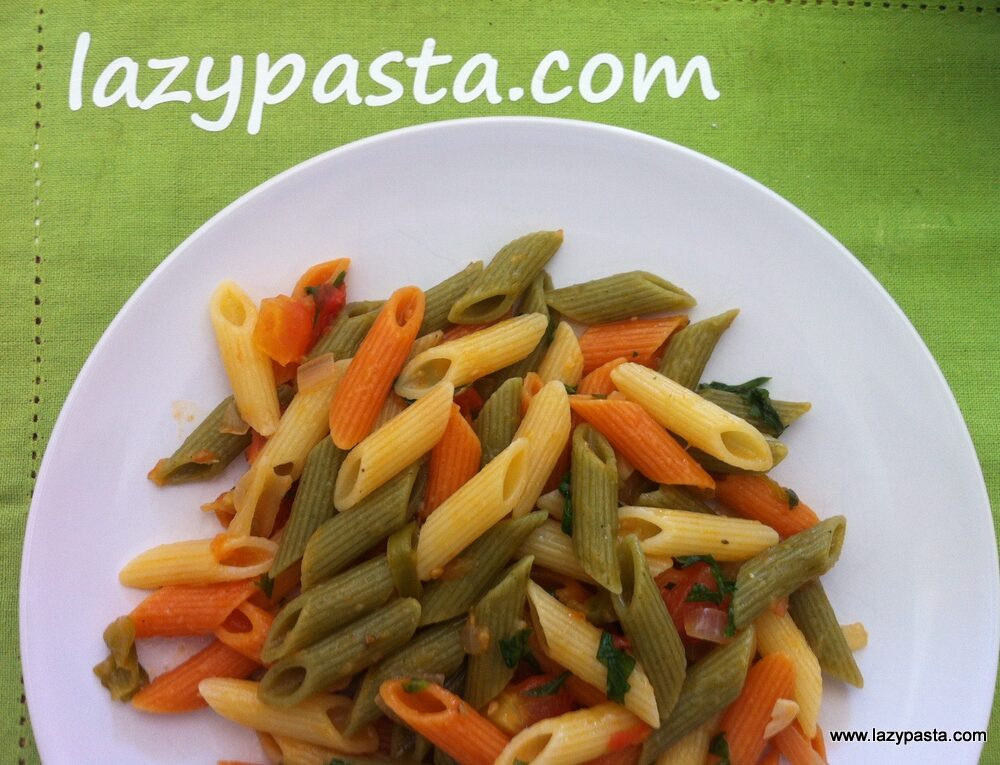 Mezze penne tricolore with fresh tomatoes